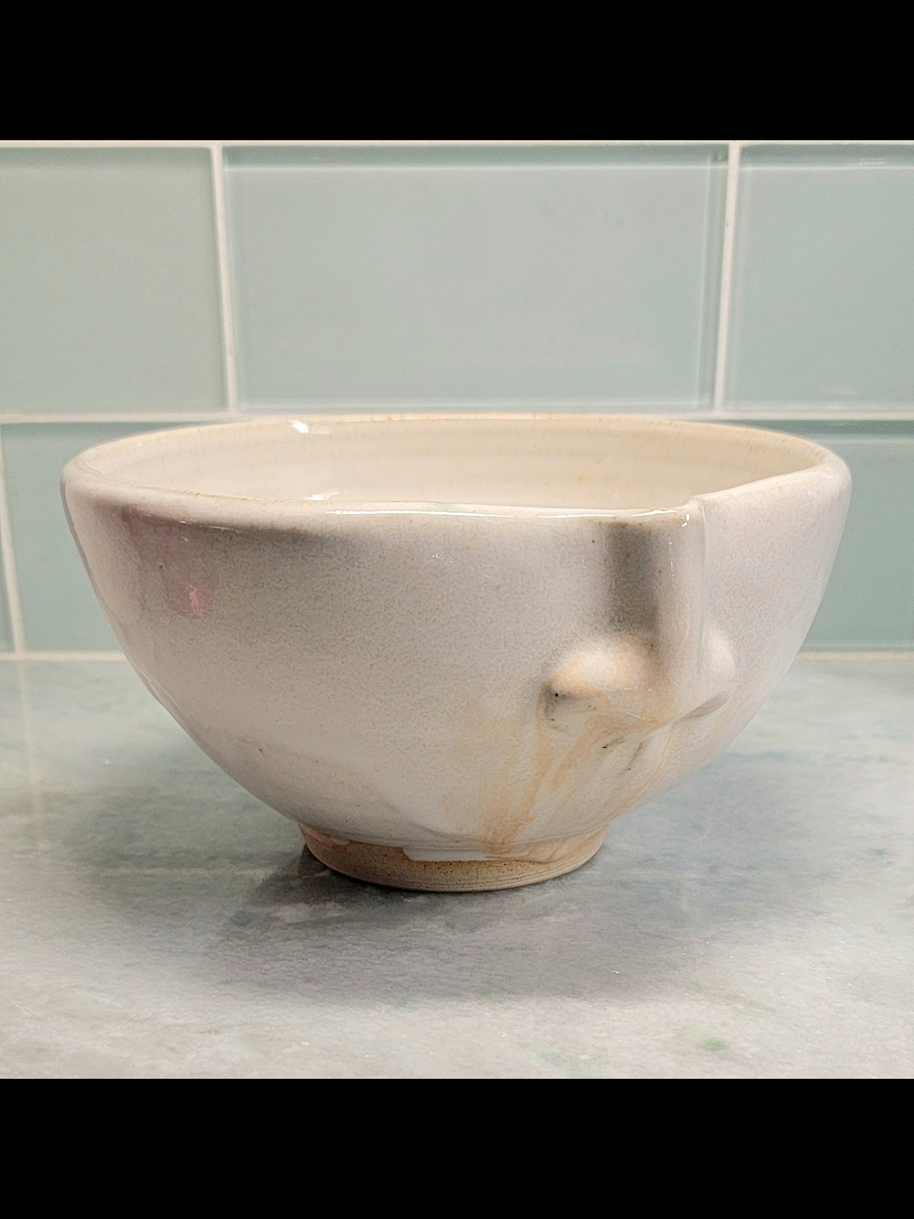 Handmade Pottery Bowl with  Cream Drip Glaze, Nose
